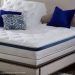 mattress and blue pillow