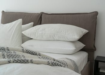 white pillows on a bed
