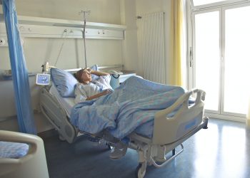 woman sleeping on a hospital bed